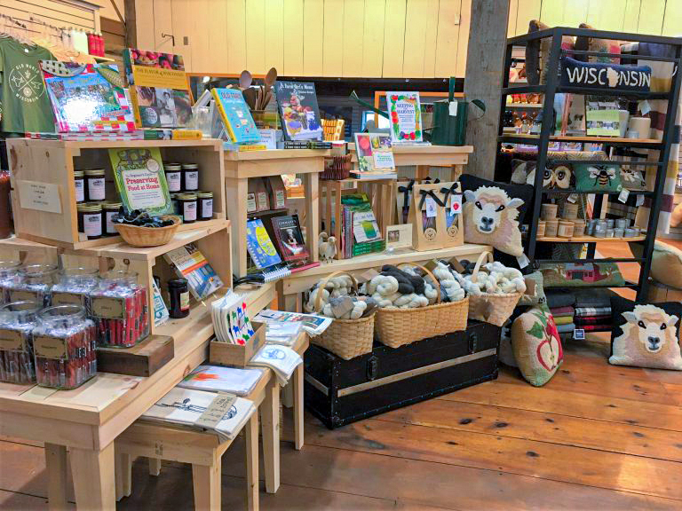 A fully stocked gift shop at Old World Wisconsin! Sheep pillows, food and drinks, books about the area and the history, food stuff, and other fun gift items.